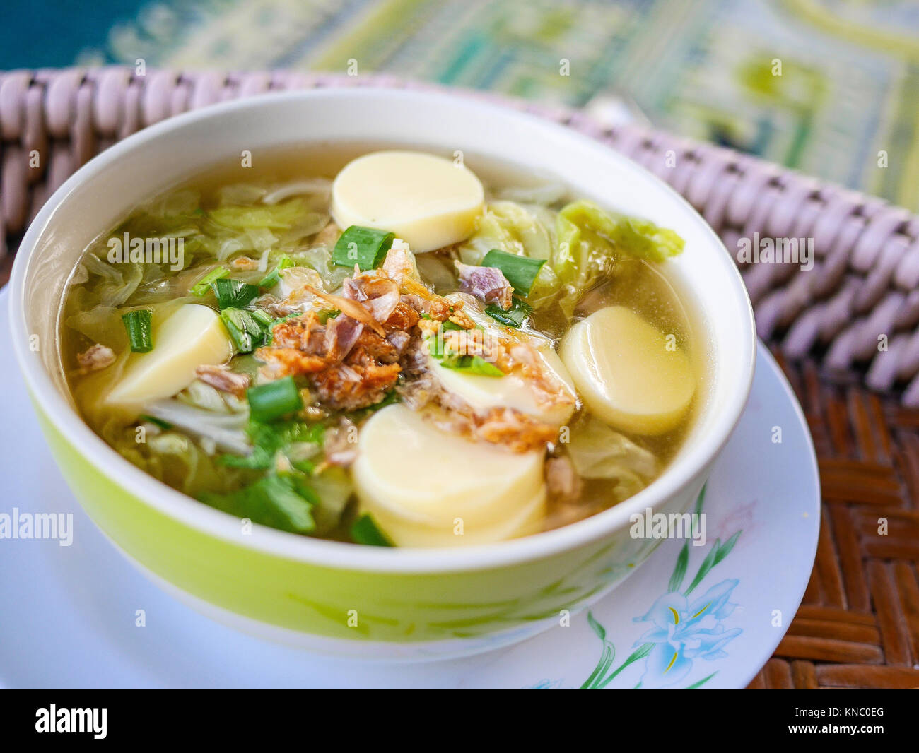 vegetarian tofu soup with deep fried garlic, cabbage,Spring onion  in the bowl Stock Photo