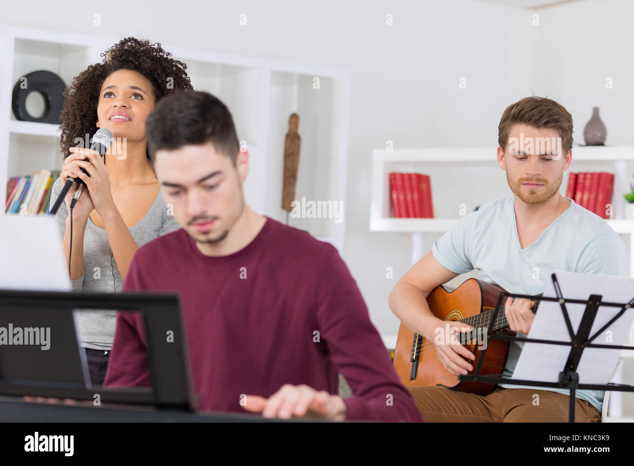 home band learning new song together Stock Photo Alamy