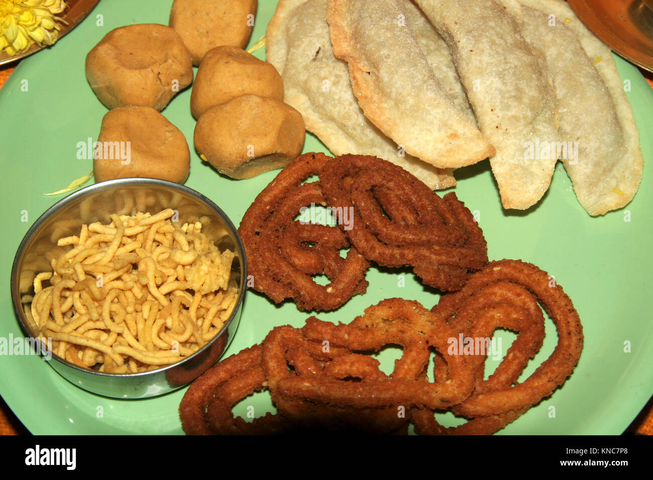 Variety of Indian sweets and hot, salty snacks Stock Photo - Alamy