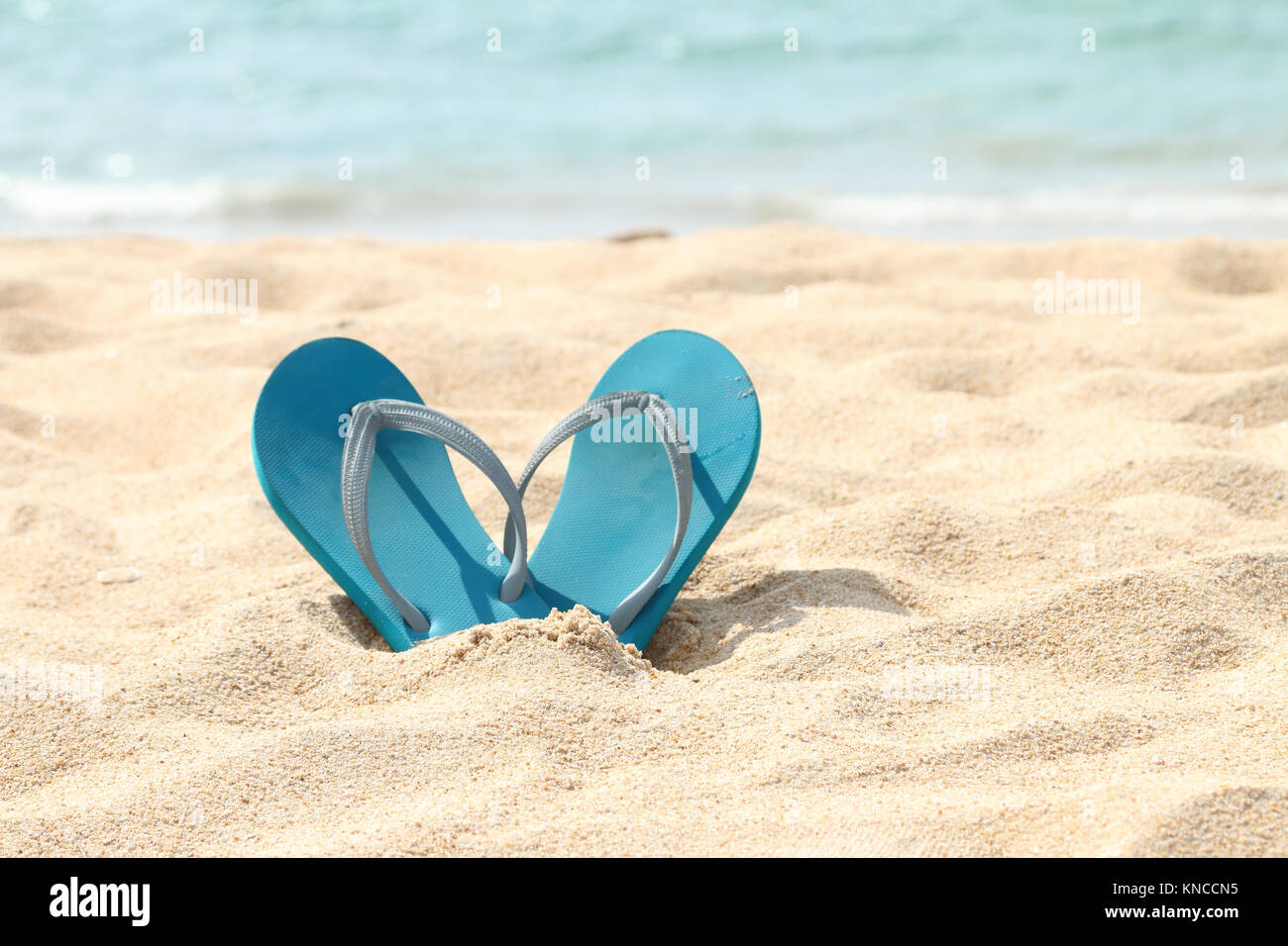 flip flops on a beach