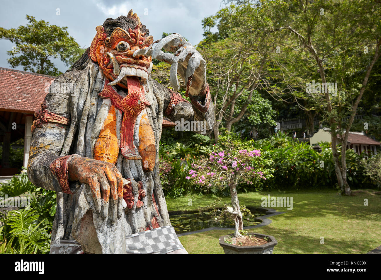 Statue of Rangda, the demon queen, in the Tirta Gangga water palace ...