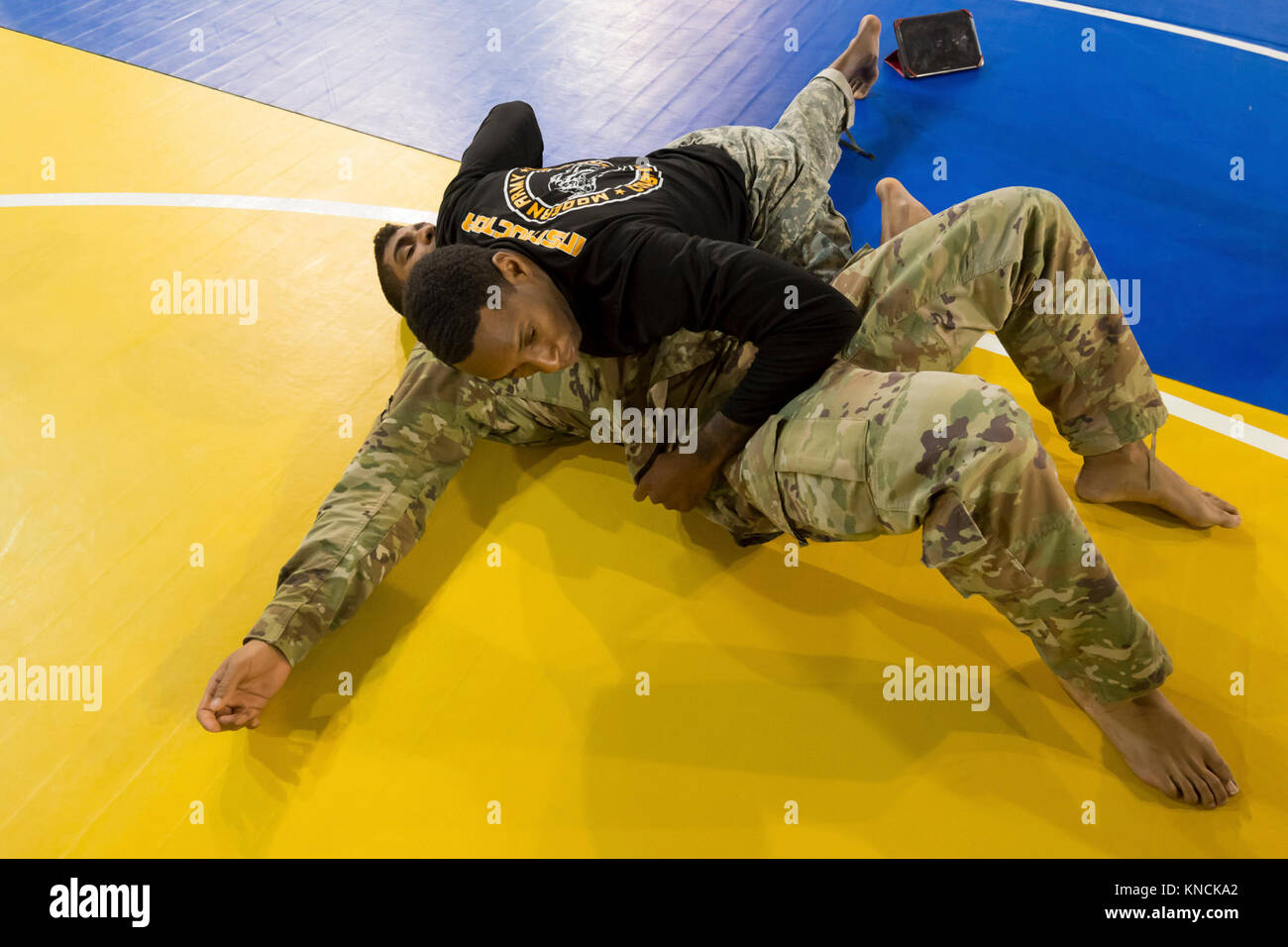 U.S. Army Staff Sgt. Romel Curtis, an Army combatives instructor ...