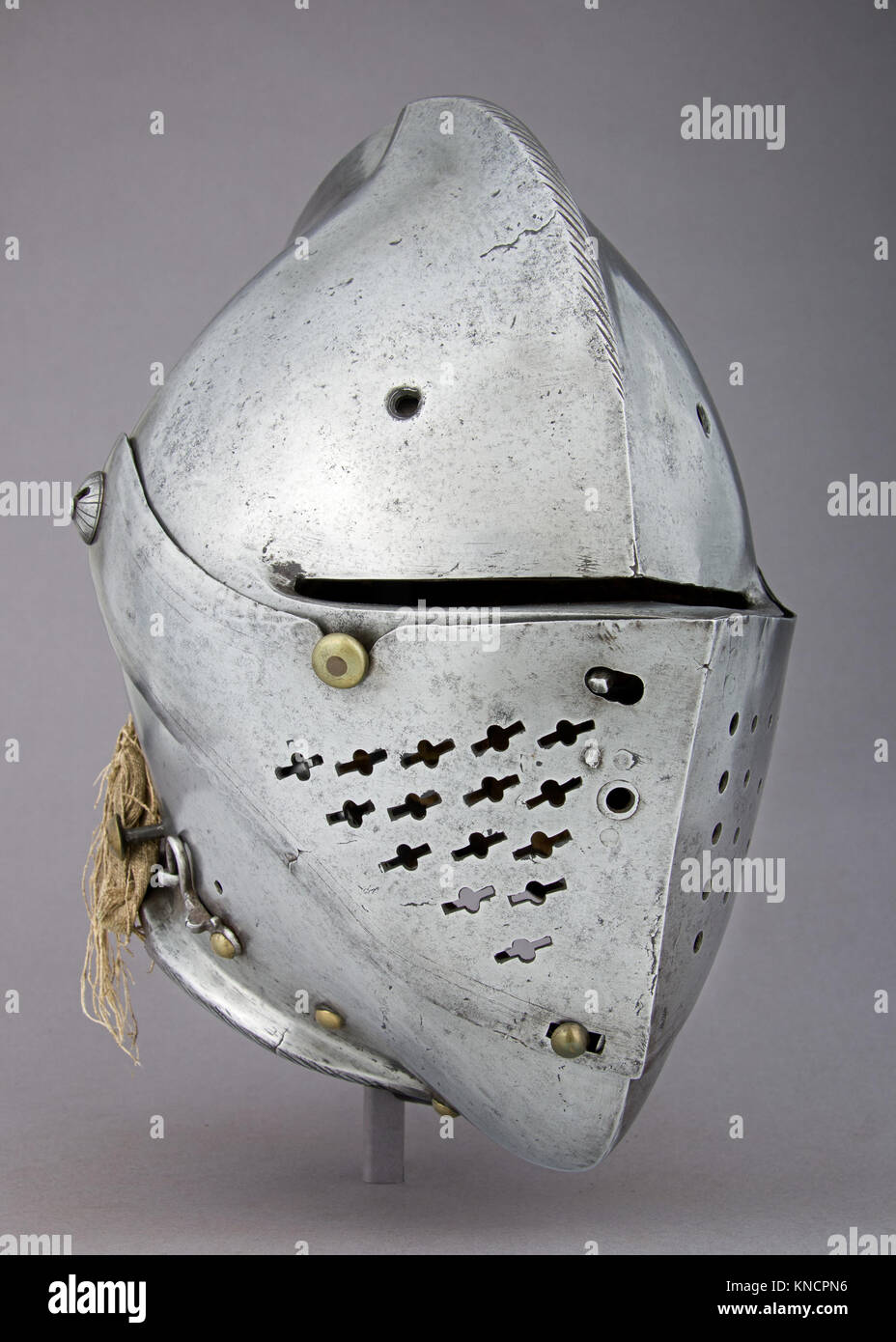 This close helmet represents medieval tournament armor, reflecting ...