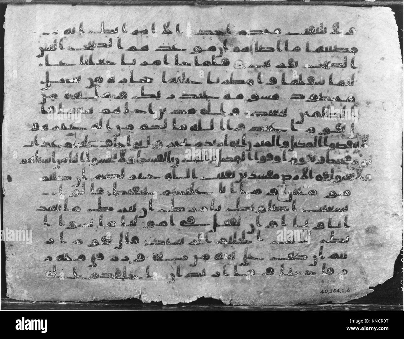 This folio from a Qur'an manuscript features intricate calligraphy and ...