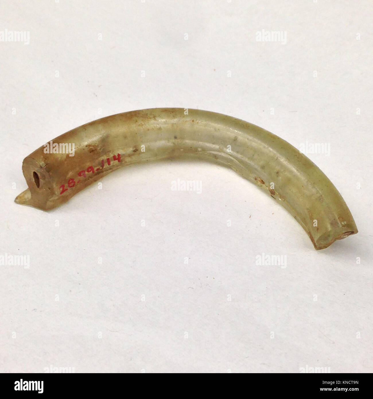 This fragment, part of the MET collection, represents a broken piece of a larger object. Its origins and specific use are part of ongoing research and preservation. Stock Photo