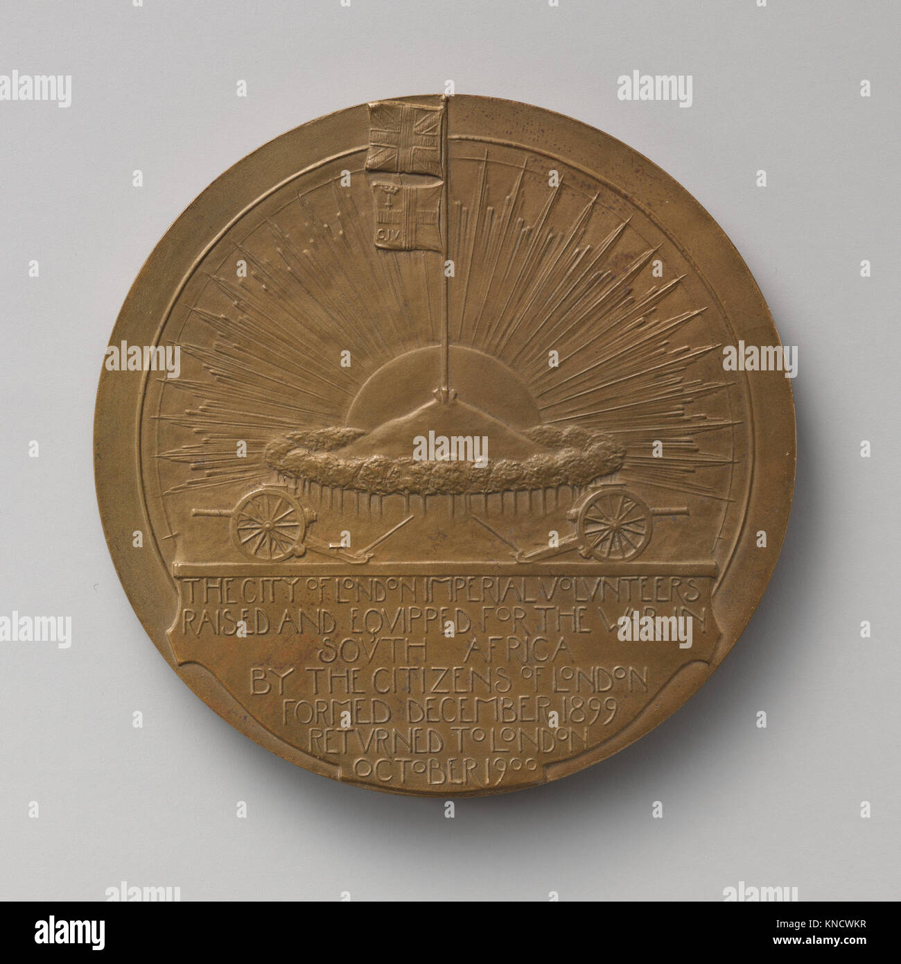 This bronze medal commemorates the return of the City Imperial Volunteers (CIV) from South Africa in 1900. Designed by George Frampton, the medal depicts the historical event of the volunteers' return after serving in the Second Boer War. The medal, struck in bronze, has a diameter of 3 inches and was gifted to the Metropolitan Museum by the Corporation of the City of London in 1908. Stock Photo