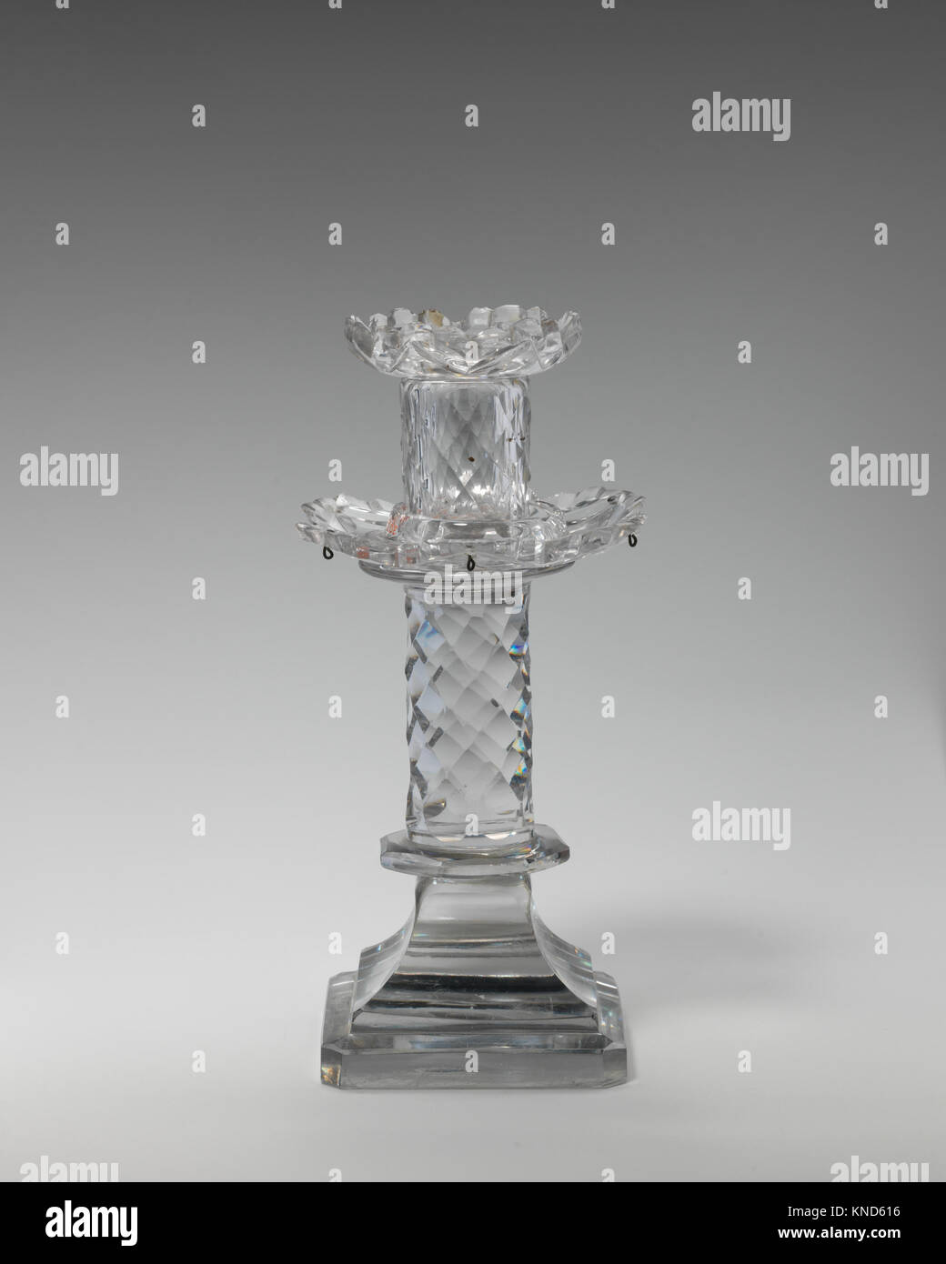 Candlestick MET DP-1588-035 196665 British or Irish, Candlestick, late 18th?early 19th century, Glass, H. 8 in.  (20.3 cm). The Metropolitan Museum of Art, New York. The Sylmaris Collection, Gift of George Coe Graves, 1930 (30.120.267a, b) Stock Photo