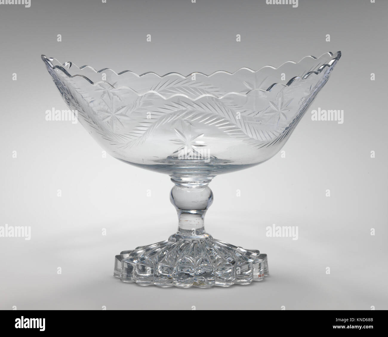 Fruit bowl MET DP-1618-032 196652 probably Irish, Fruit bowl, late 18th?early 19th century, Glass, H. 9 3/4 in.  (24.8 cm); L. 13 1/8 in. (33.3 cm.). The Metropolitan Museum of Art, New York. The Sylmaris Collection, Gift of George Coe Graves, 1930 (30.120.249) Stock Photo