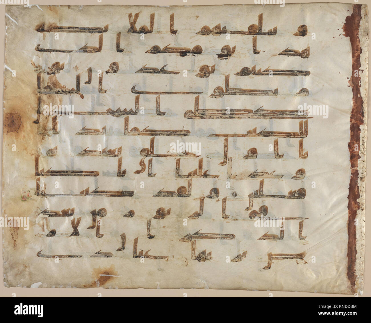 This Tashkent Qur'an folio displays Arabic calligraphy and artistic ...