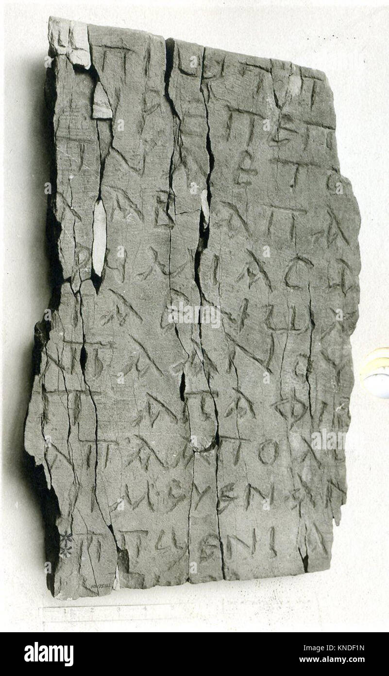 This slab fragment is part of a larger artwork or structure ...
