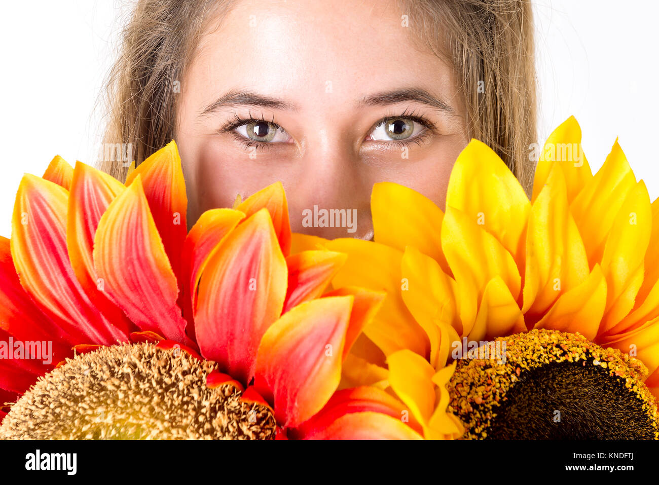 Beautiful young woman with flowers isolated in a white background Stock ...