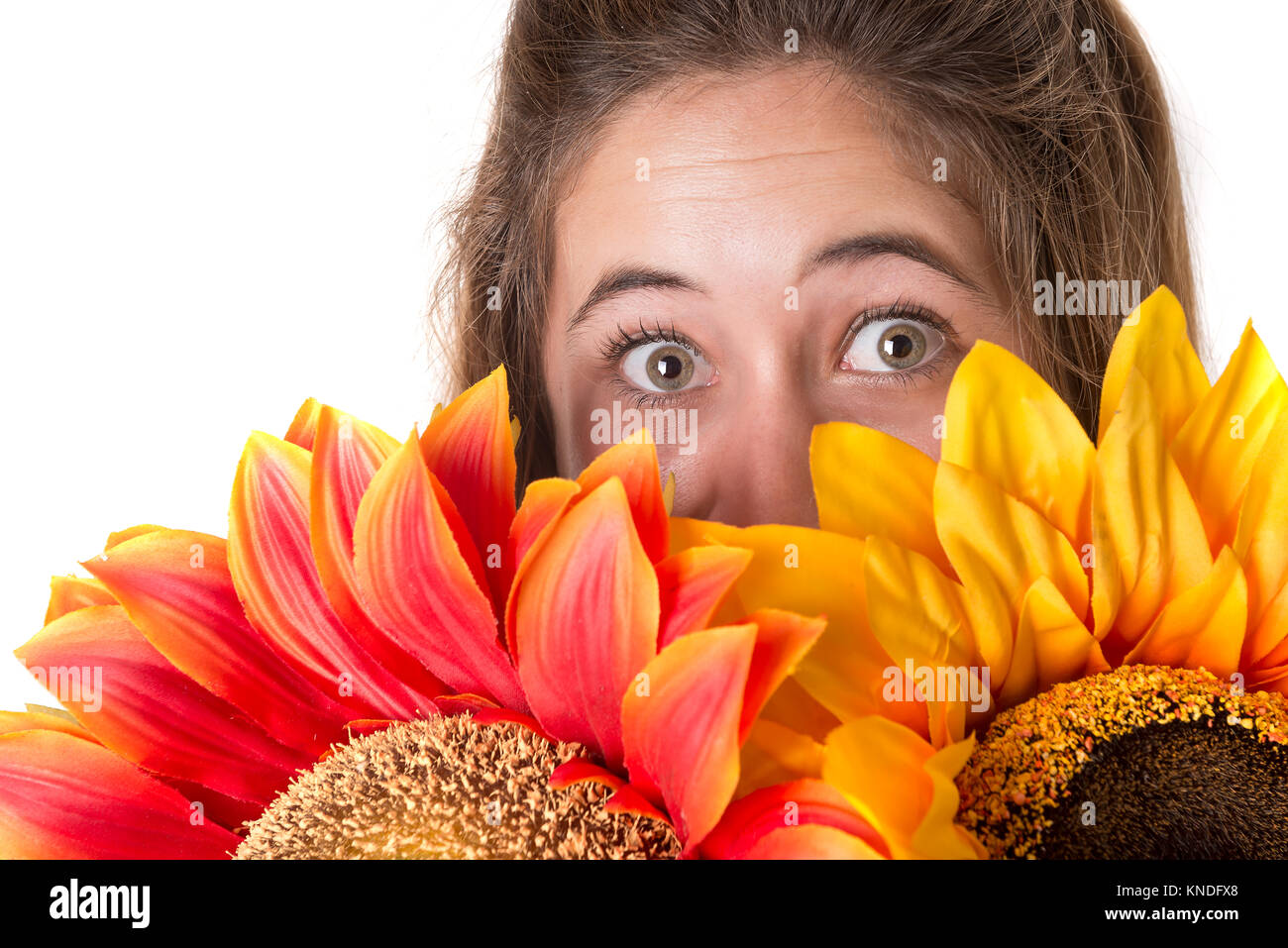 Beautiful young woman with flowers isolated in a white background Stock ...