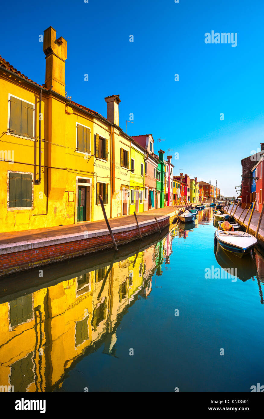 Venice landmark, Burano island canal, colorful houses and boats, Italy ...