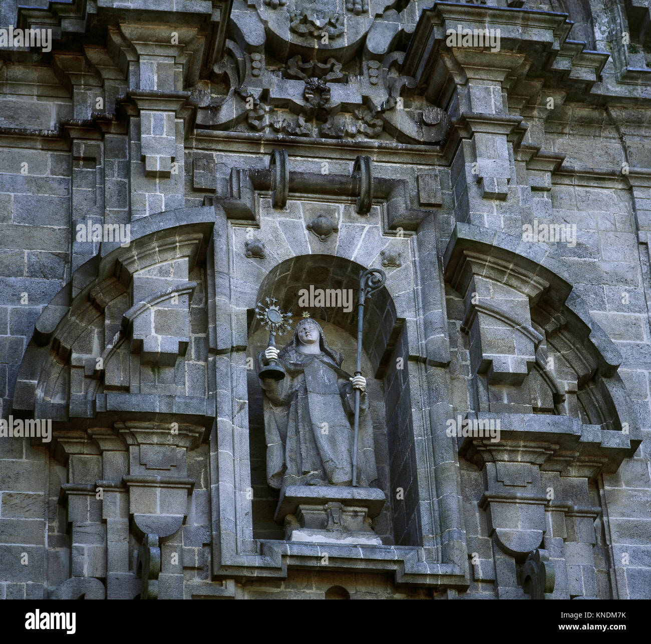 Statue of Clare of Assisi (1194-1253). Italian saint. Baroque facade of da Igrexa, by Simon Rodriguez, 1719. Convent of Saint Clare. Santiago de Compostela. Galicia, Spain. Stock Photo
