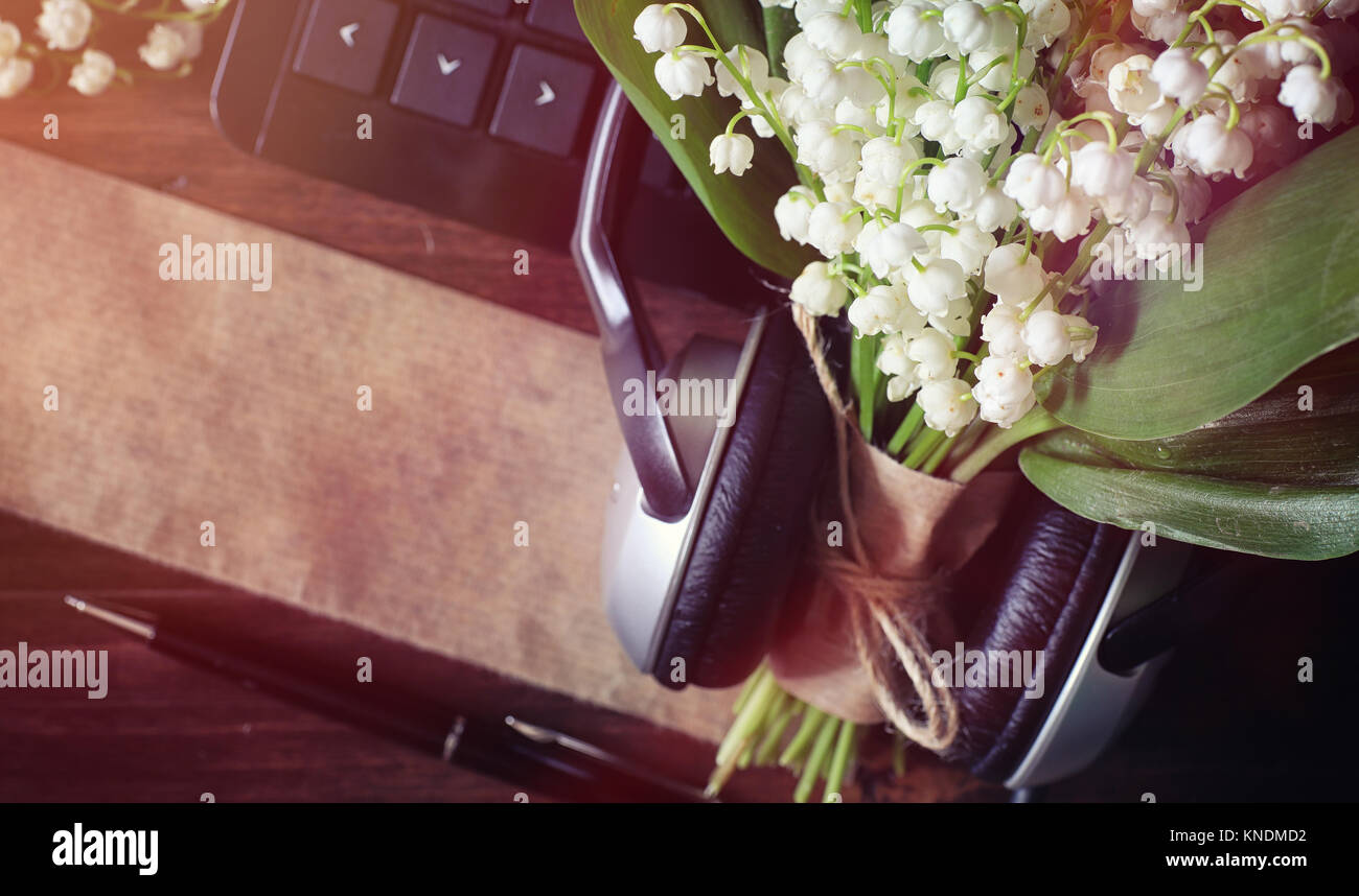 Bouquet of lilies of the valley on a table Stock Photo - Alamy