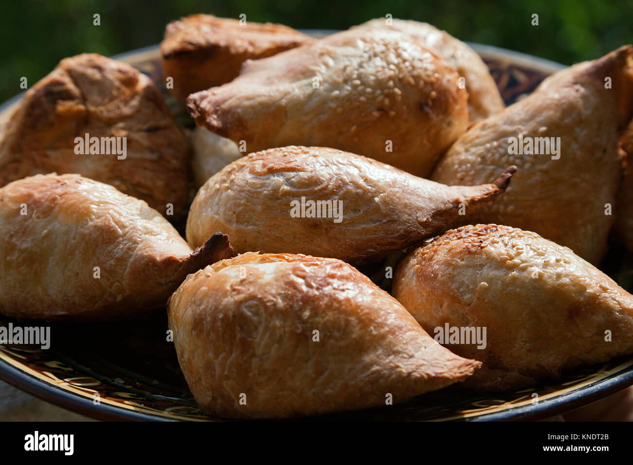 Uzbek traditional pastry samsa Stock Photo - Alamy