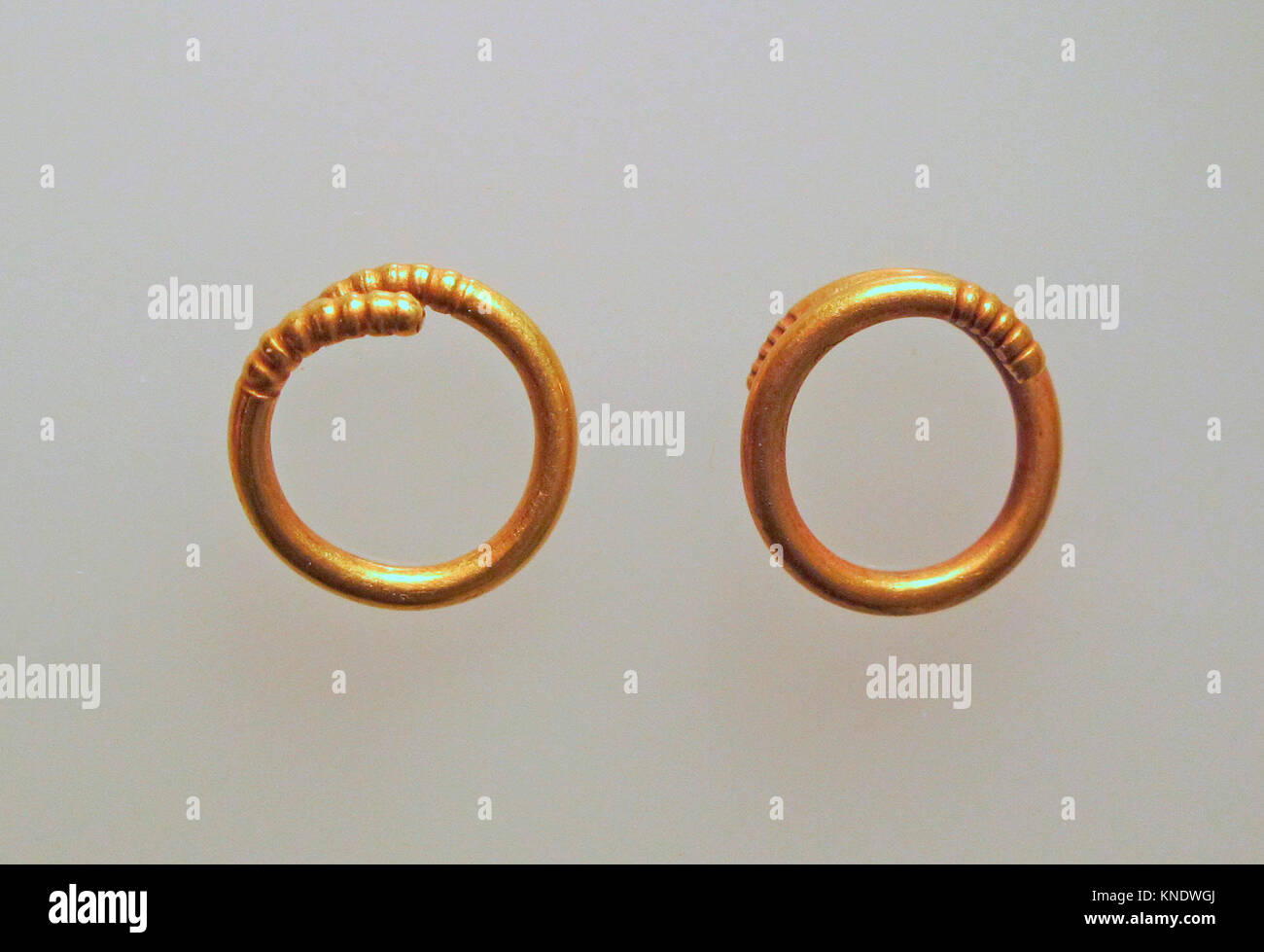Earring or spiral. Culture: Cypriot; Medium: Gold; Dimensions: Diameter (.c): 3/8 x 1/16 in. (1 x 0.1 cm); Classification: Gold and Silver Stock Photo