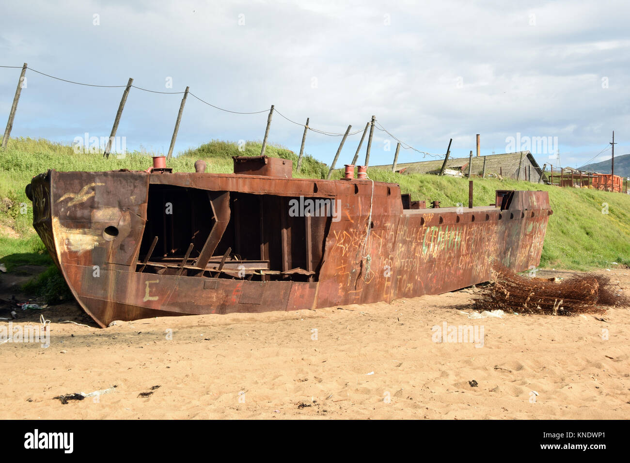 In Magadan, the wreck of a barge used to unload prisonners from the boats coming from Vladivostok at the time of the Dalstroi organization. Stock Photo