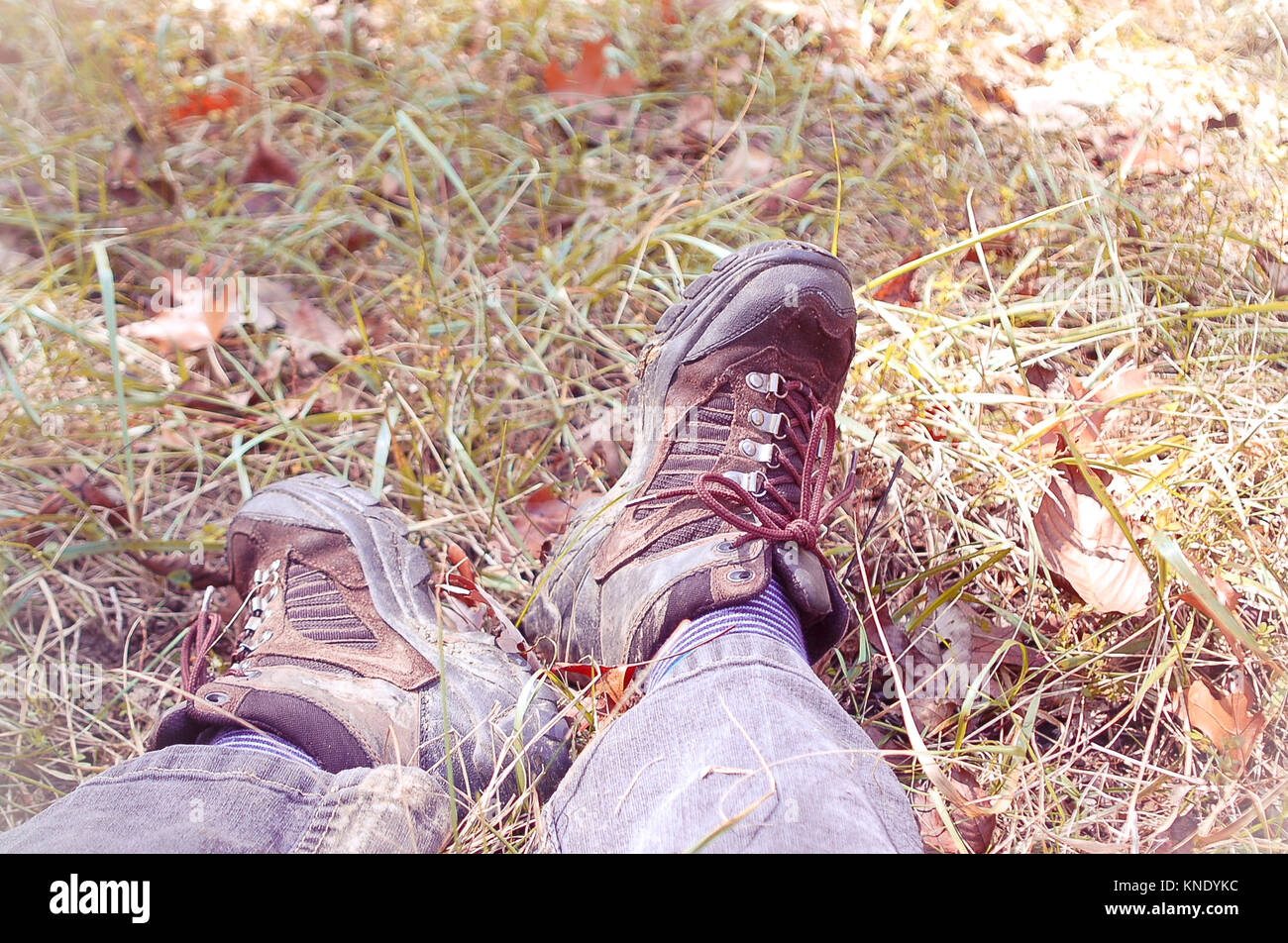 Feet in Hiking Boots Relaxing in the Grass Stock Photo Alamy