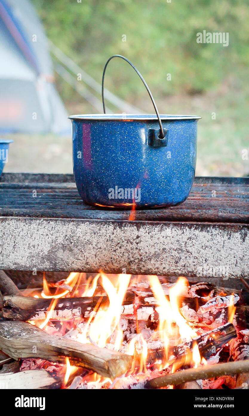 Blue Pan Cooking over a Campfire Stock Photo Alamy