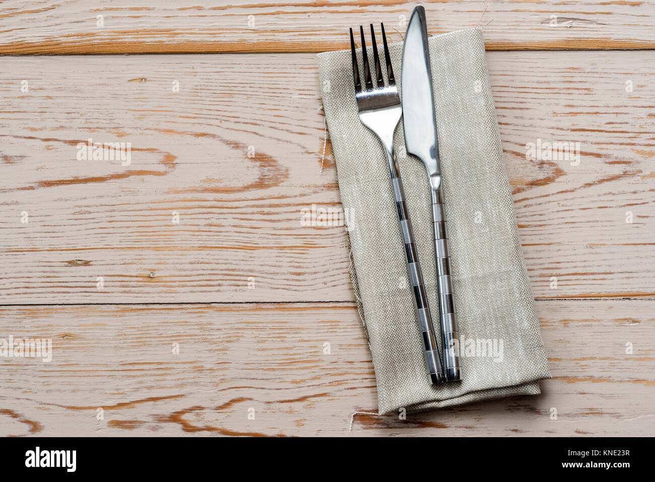 Knife, fork, napkin, serviette, place or table setting. Stock Photo