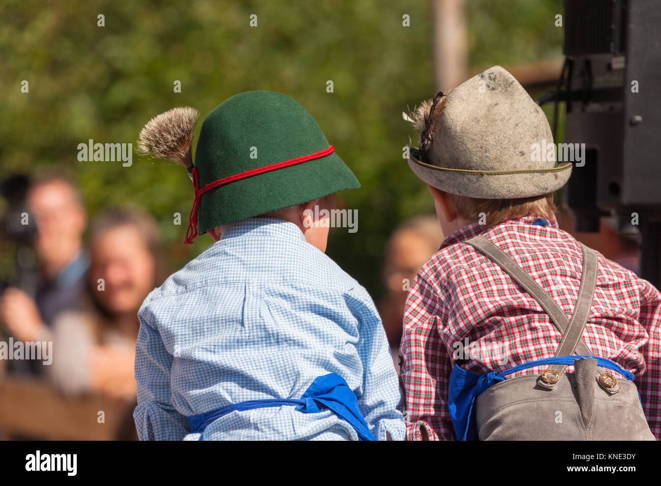 Young children in typical costume during an autumn local celebration in Val di Funes ( South Tyrol ) Stock Photo