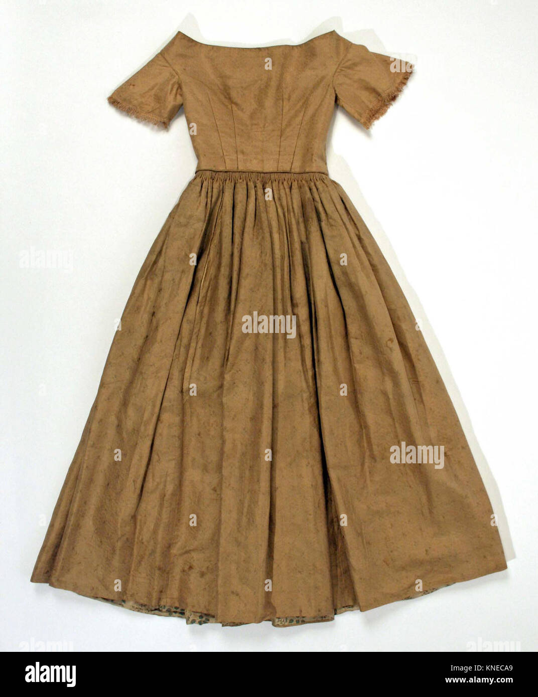 This historical dress reflects the fashion and textile design of its ...