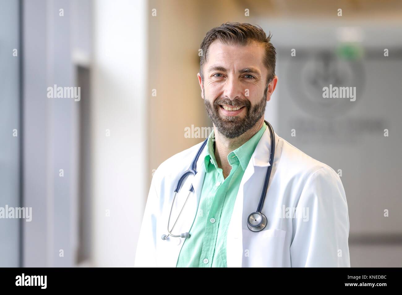 Doctor in corridor, Hospital Stock Photo