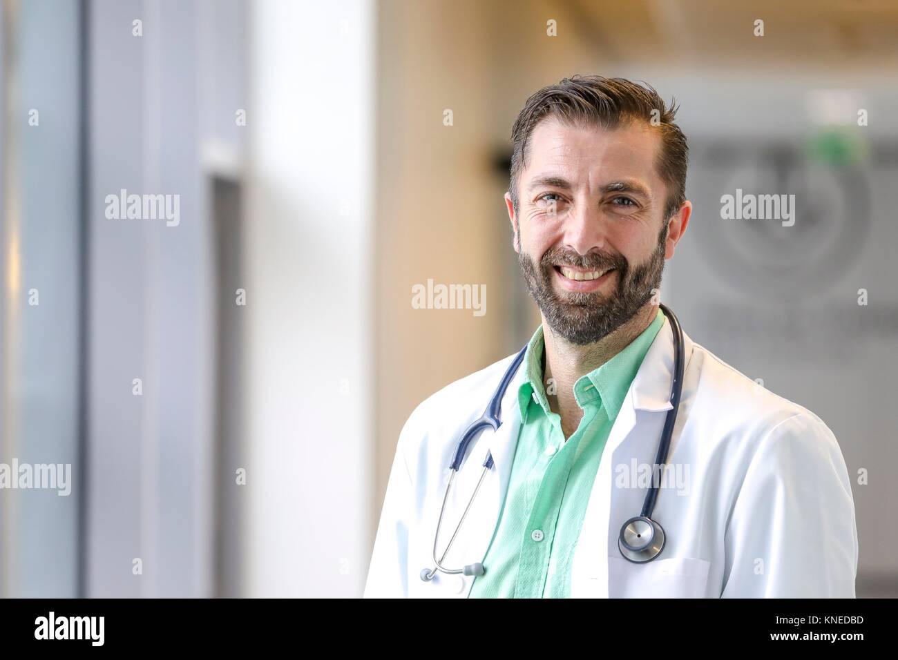 Doctor in corridor, Hospital Stock Photo