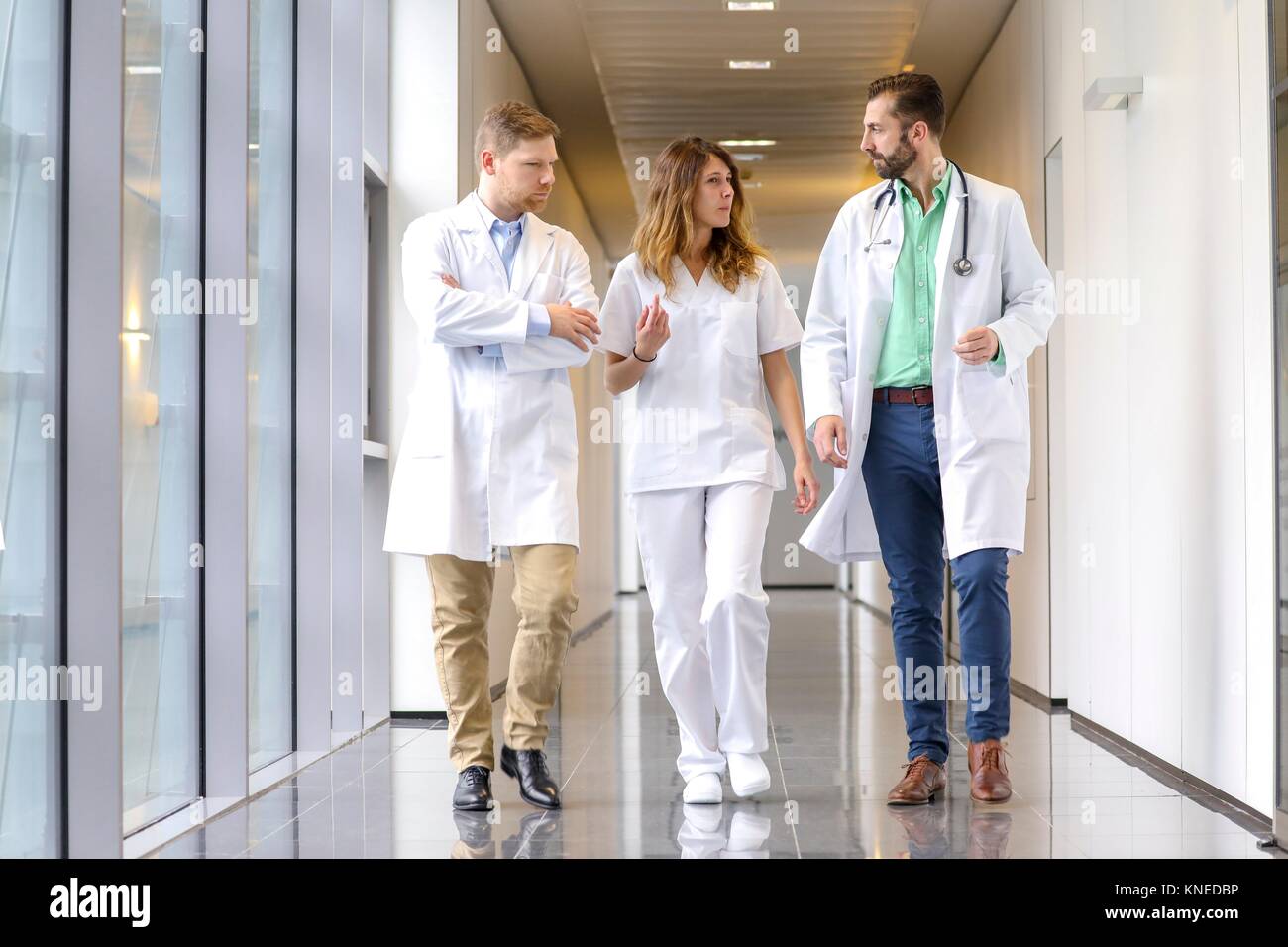 Doctors And Nurses Walking In Corridor Hospital Stock Photo Alamy