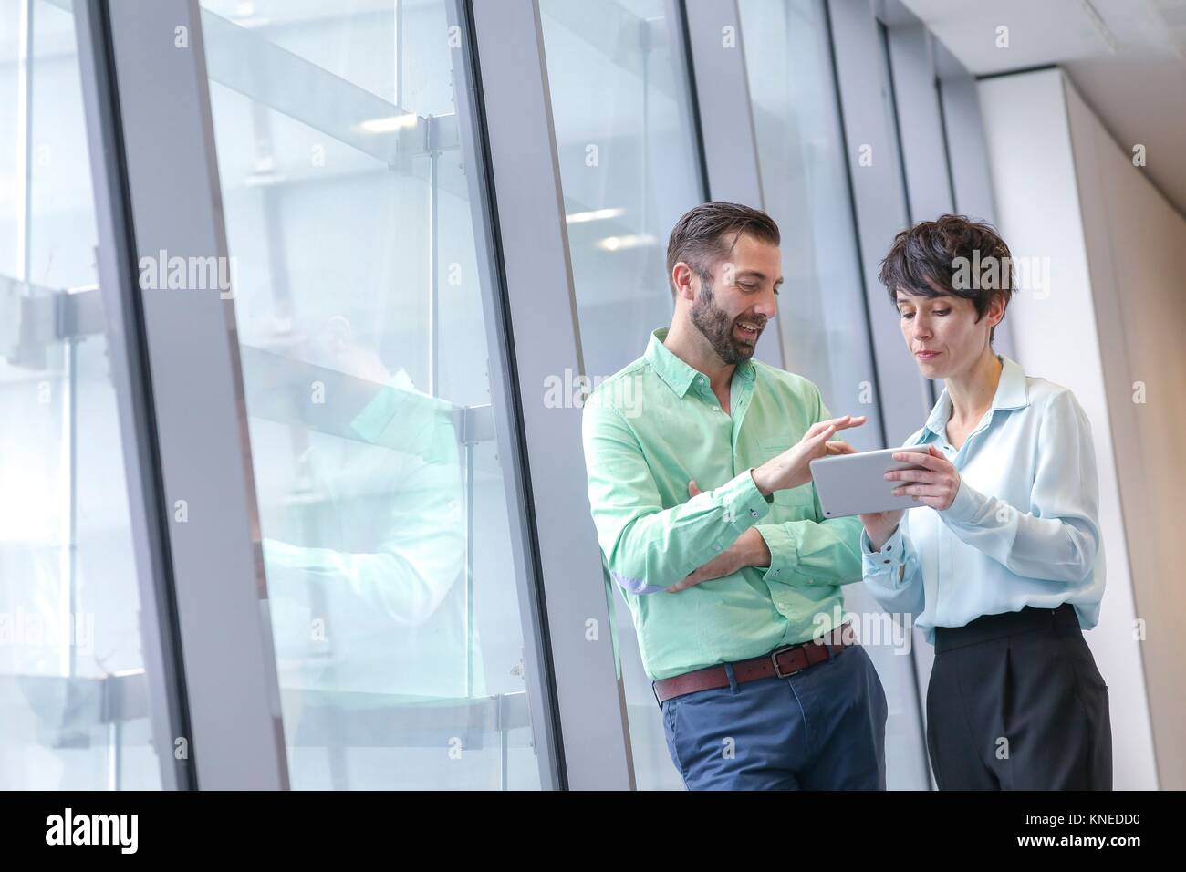 Executive couple with tablet Stock Photo