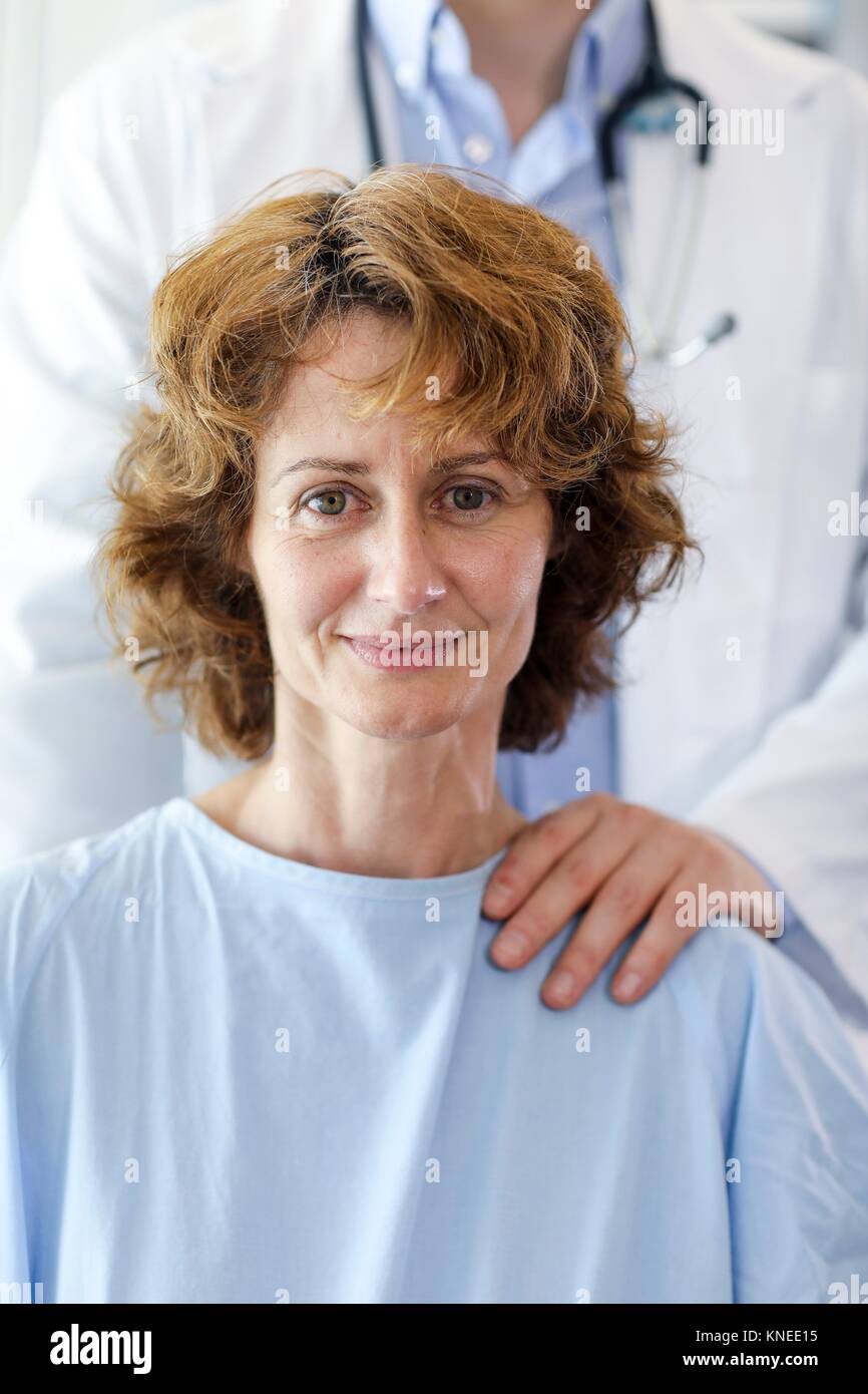 Doctor and woman patient hi-res stock photography and images - Alamy