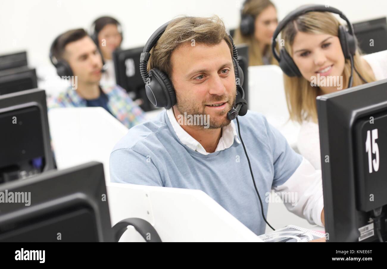 Students in language laboratory, Language training classroom