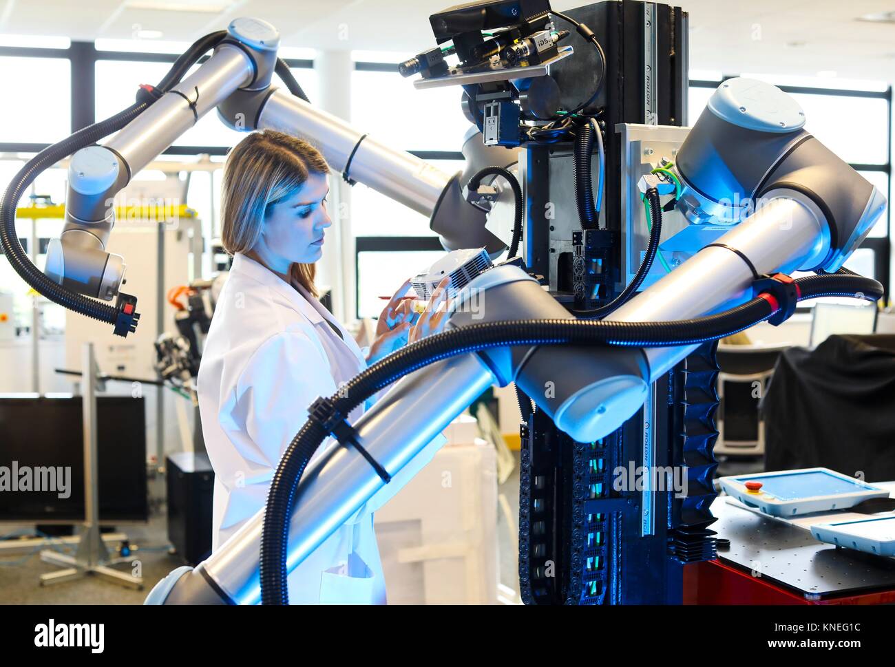 Robot with two arms for mobile manipulation, Humanoid robot for automotive assembly tasks in collaboration with people, Industry, Tecnalia Research & Stock Photo