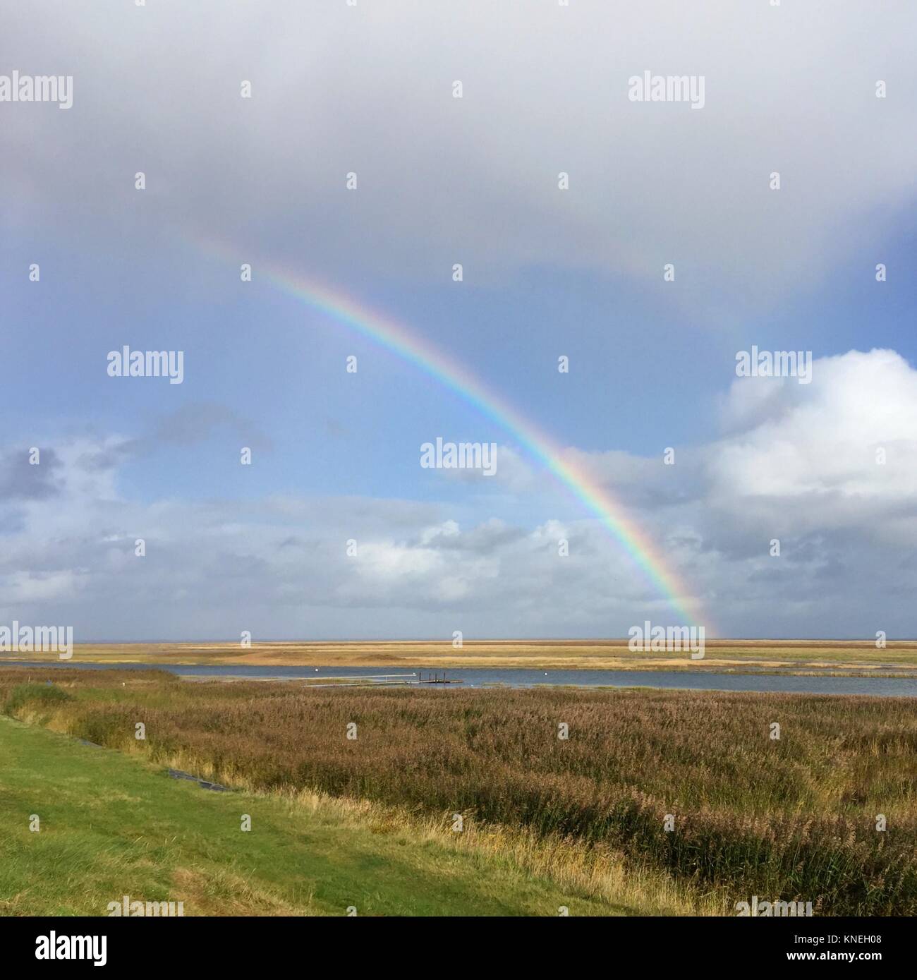 Rainbow over rural landscape, Sonderho, Fanoe, Denmark Stock Photo - Alamy