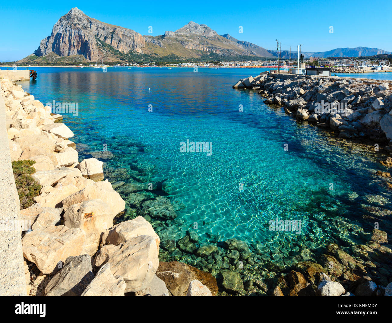 San Vito lo Capo beach with clear azure water and Monte Monaco in far,  north-western Sicily, Italy. People unrecognizable Stock Photo - Alamy