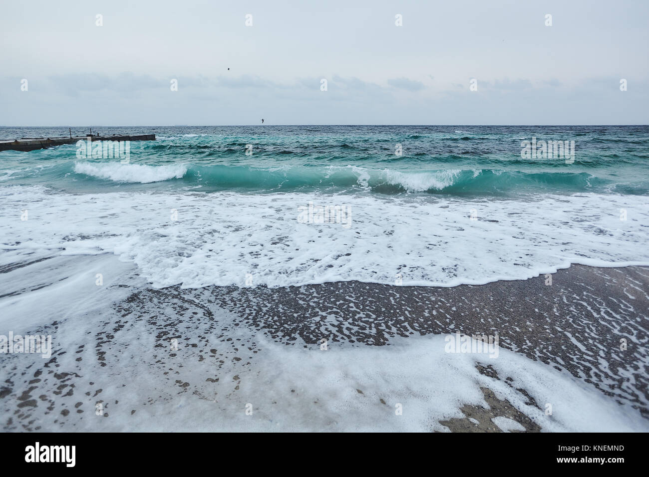 Lapping waves on beach, Odessa, Odessa Oblast, Ukraine, Europe Stock Photo