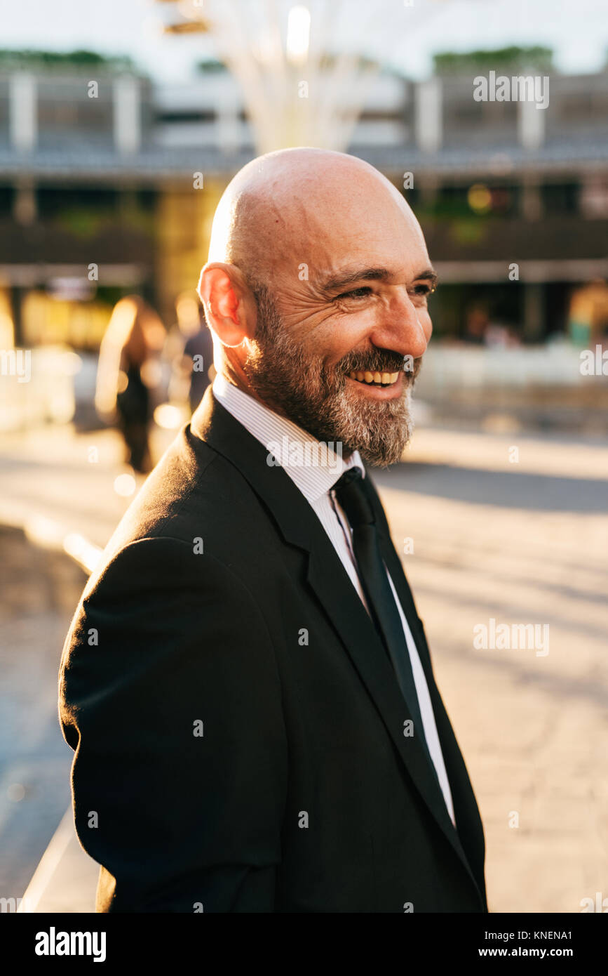 Portrait of mature businessman outdoors, smiling Stock Photo - Alamy