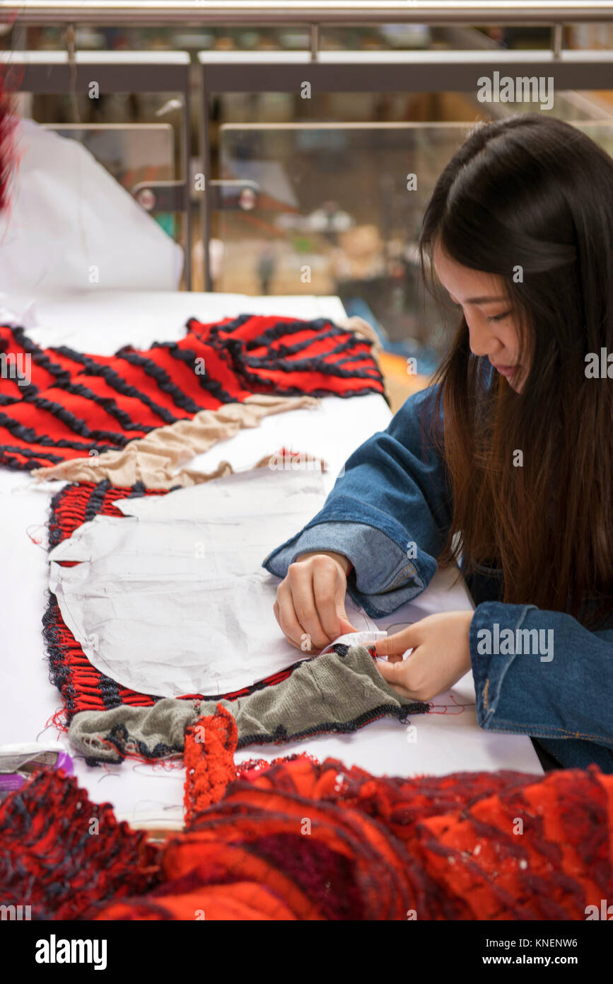 Seamstress creating garment Stock Photo