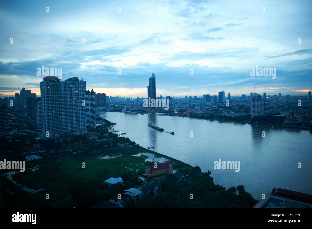 Dawn cityscape with Chao Phraya river, Bangkok, Thailand Stock Photo