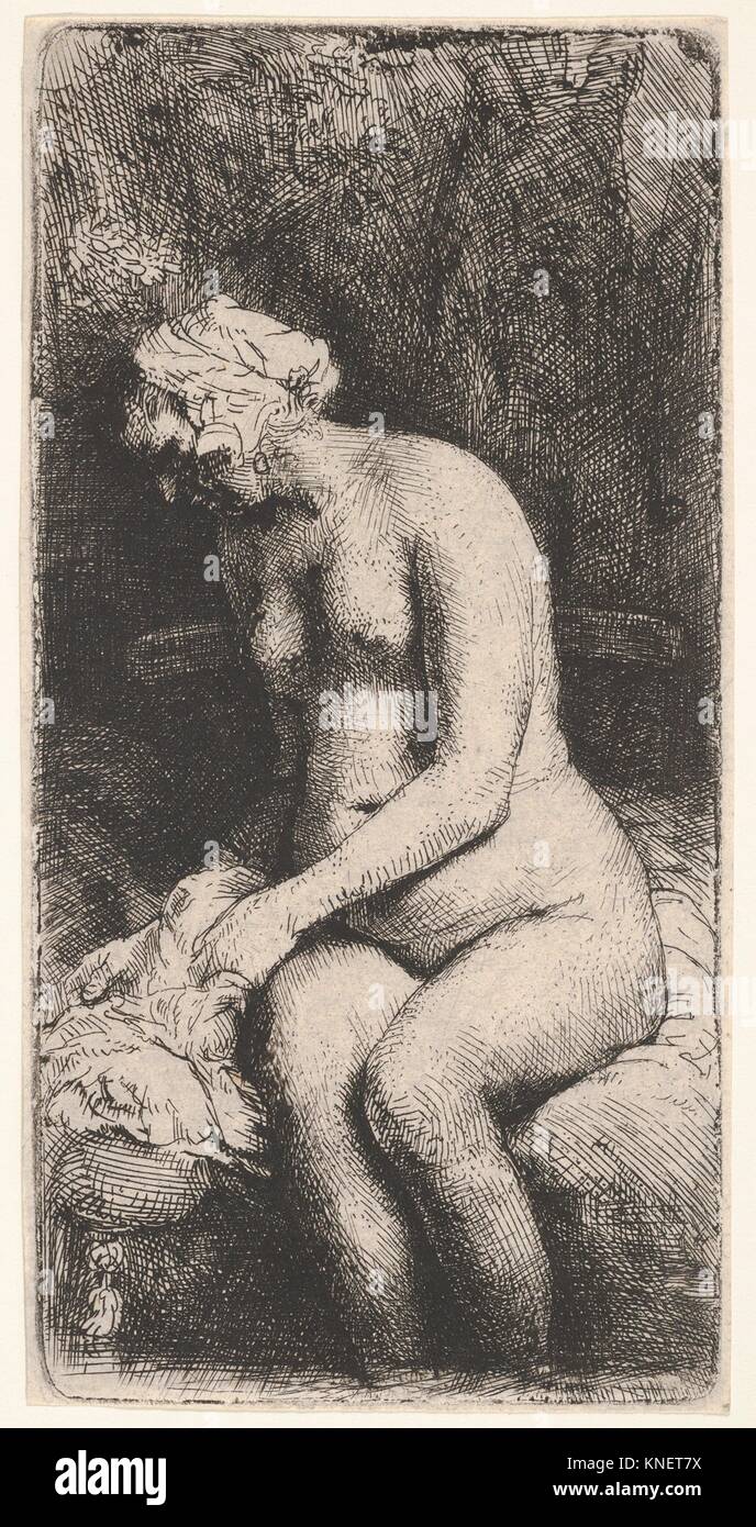 Woman Bathing. Artist: Rembrandt (Rembrandt van Rijn) (Dutch, Leiden 1606-1669 Amsterdam); Date: 1658; Medium: Etching; Dimensions: sheet: 6 5/16 x 3 Stock Photo