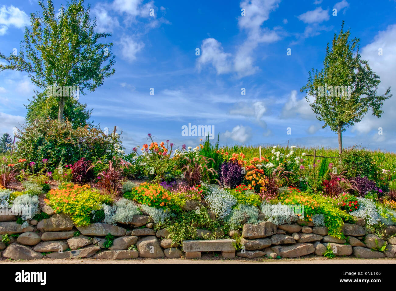 Rockery in St-Fraimbault a Normandy village in the Orne in summer, France Stock Photo