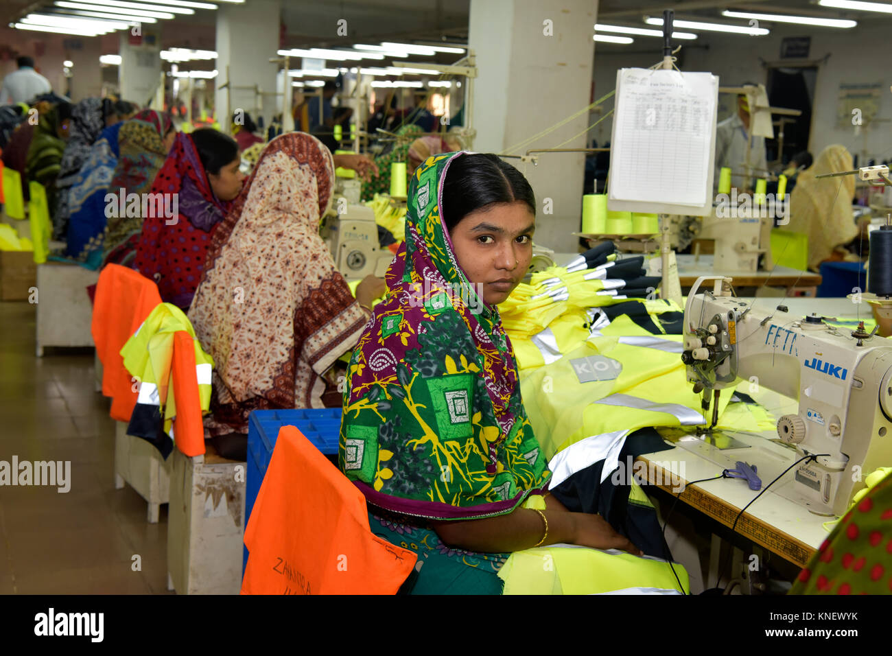 DHAKA, BANGLADESH - DECEMBER 26, 2016: Bangladeshi garments workers ...