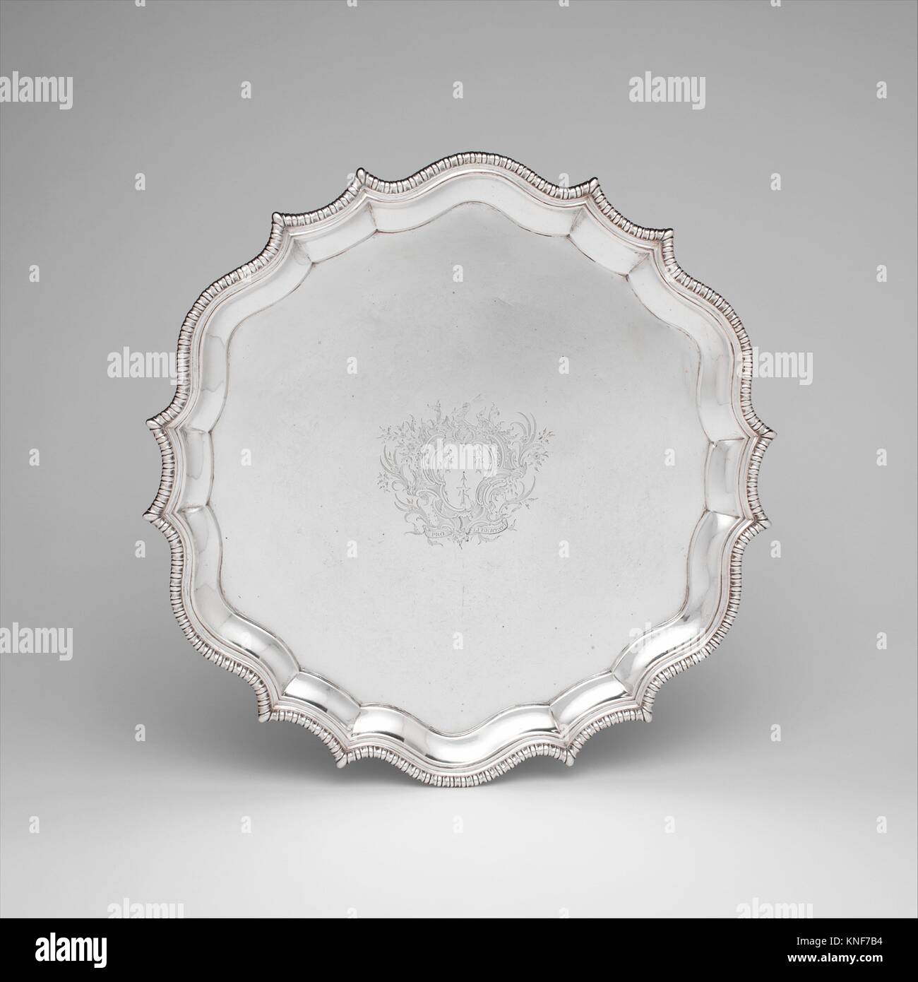 Salver. Maker: Daniel Christian Fueter (1720-1785); Date: 1754-69; Geography: Made in New York, New York, United States; Culture: American; Medium: Stock Photo