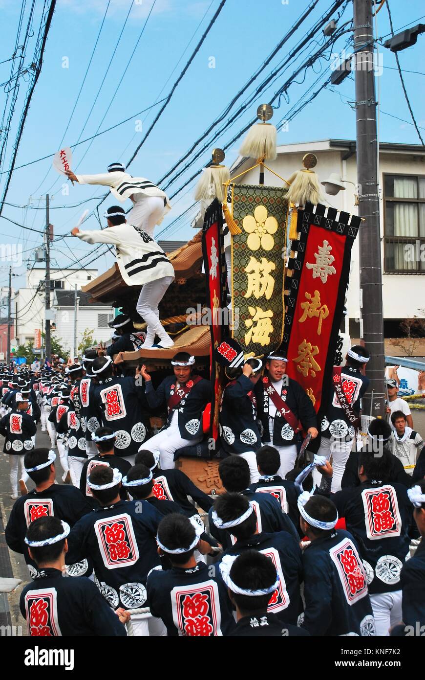 Annual Danjiri festival in Osaka, Japan. Each team consists of a wooden float with a commander standing at the top and compete by racing the float. Stock Photo