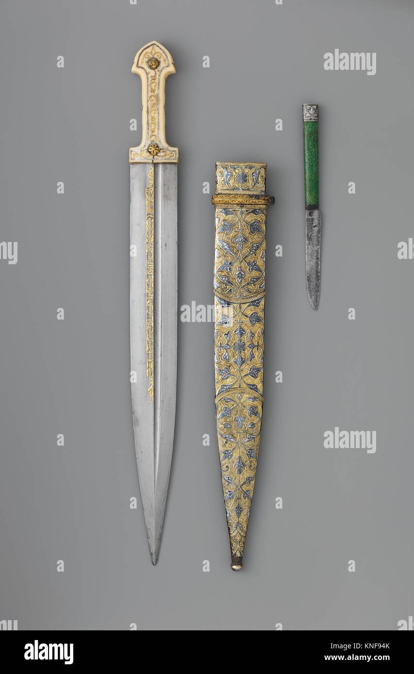 Dagger (Qama) with Sheath and Knife. Date: dated, 1856-57, 1861; Culture: Caucasian; Medium: Steel, bone, silver, gold, shark skin, ivory, niello, Stock Photo