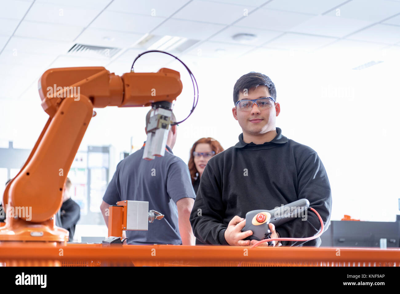 Robot wearing clothes hires stock photography and images Alamy