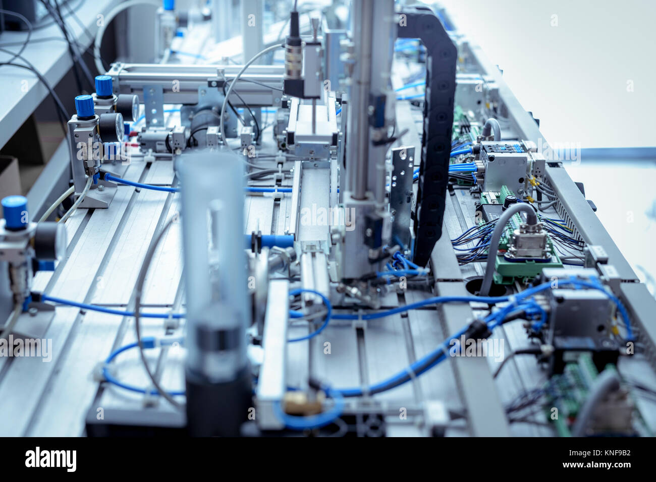 Production line simulation equipment in robotics facility Stock Photo
