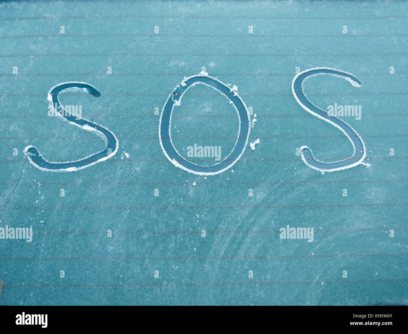 SOS sign for help needed Stock Photo
