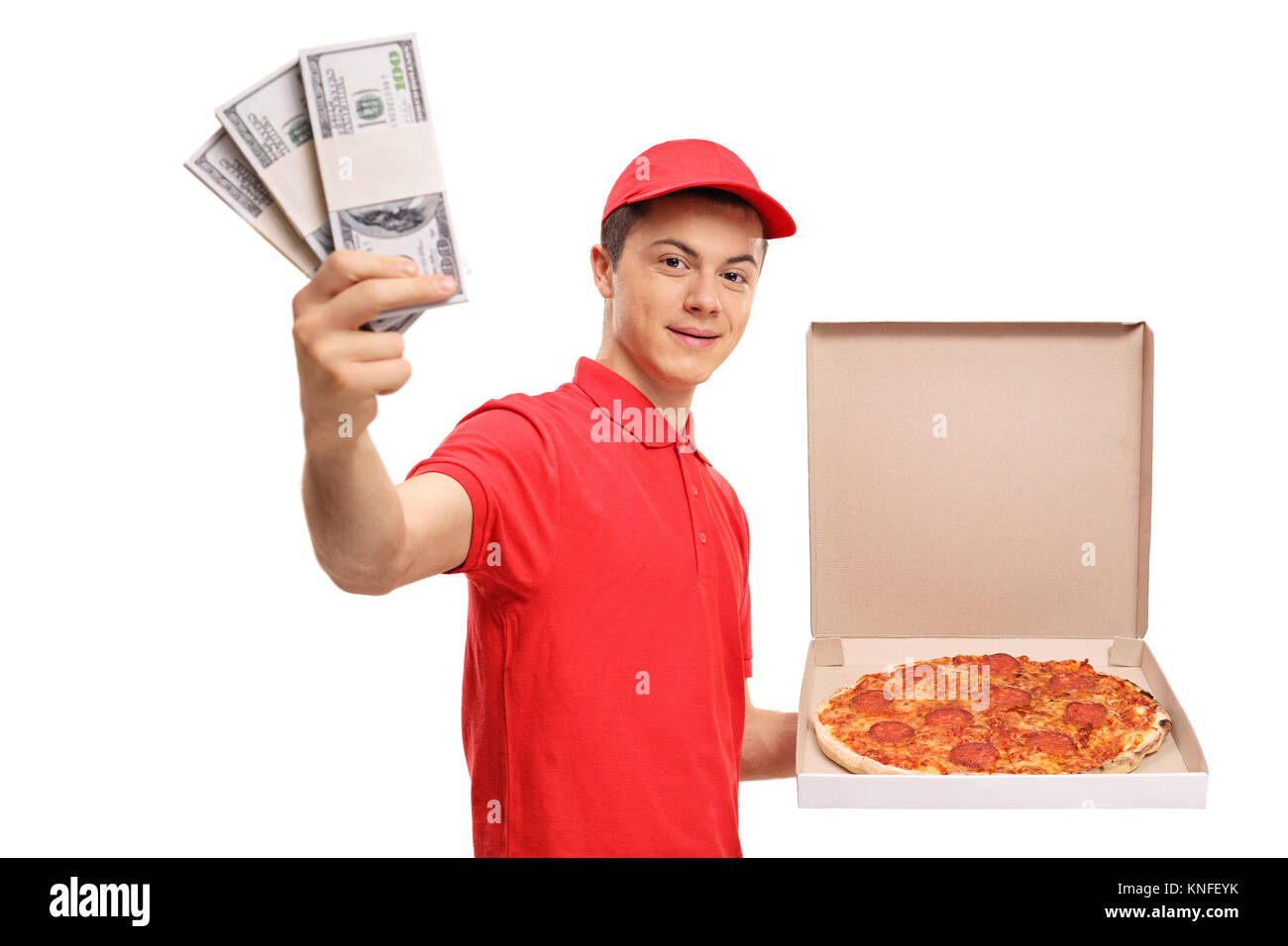 Teenage pizza delivery boy with bundles of money isolated on white